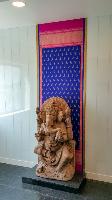 A Statue of Ganesa placed against a backdrop made from a saree. This is just outside the door to the MD's cabin.